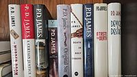 Spine view of all nine P.D. James books