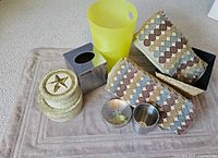 Group shot of all bathroom items on bath mat