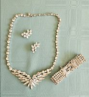 Full view of necklace, bracelet, and earrings set