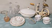 Full lot overview showing tureen, crystal, plates, grinder, etc.