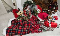 Overall lot with wreath, blanket, berry stems, plush stockings and decorations