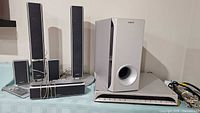 Complete Sony surround sound set: five speakers, subwoofer, amplifier, cables