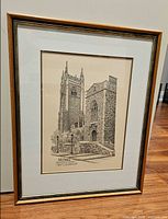 Full view of framed artwork showing image, mat and frame
