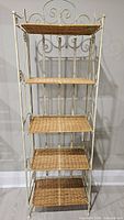 Front view of entire 5-shelf rattan and metal unit
