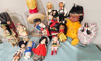 Group shot of all dolls showing variety and scale