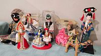Group view of all dolls and camel figure