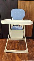 Front view showing full high chair, seat, frame and tray