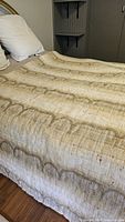 Comforter on queen bed showing overall size and color pattern