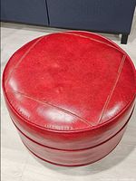 Top view showing red leather surface and stitching detail