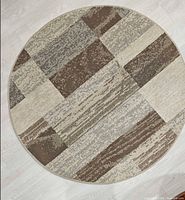 Full view of round patchwork rug