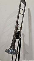 Full view of silver-plated slide trombone