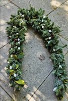 Both swag garlands arranged on ground to show full length and components