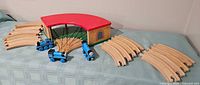 Full set showing roundhouse, three engines, curved track pieces