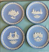 Front view of all four Wedgwood plates