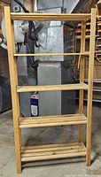 full view of one pine shelving unit