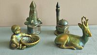 Group shot showing all four Zsolnay eozin figurines