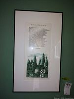 Full frontal view of framed print showing title and image