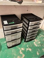 Two identical plastic drawer carts side by side