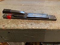 Side perspective of full stapler showing length and overall condition