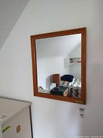 Front view of wall mirror mounted on wall