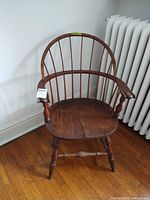 Full front view of wooden Windsor chair