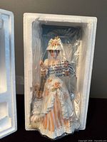 Figurine sealed in Styrofoam packaging