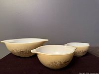 Three Pyrex Forest Fancies Cinderella bowls grouped