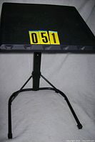 Front view of adjustable TV tray table showing tabletop and frame