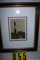 Full view of framed print showing image, mat and frame