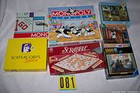 Group shot of all board games and puzzles in lot