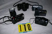 Overview showing all five cameras and flash laid out
