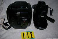 Presto Cool Daddy deep fryer and Mr. Coffee espresso maker side by side with cords