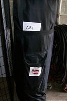 Black Quik Shade carry bag standing upright