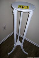 Full view of white wood plant stand