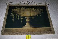 Full view of wall art showing image, fabric frame, scroll rod, size reference