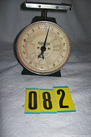 Front view of Hanson postal scale showing full dial
