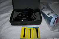 Both items together: Wahl clipper in case, Conair steamer in plastic
