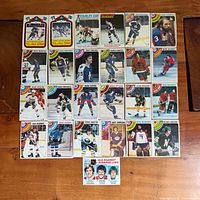 Top-down view showing all 25 1977-78 O-Pee-Chee hockey cards