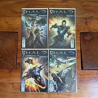 All four Halo: Escalation comic books laid out, bagged