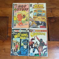All four bagged comics laid out