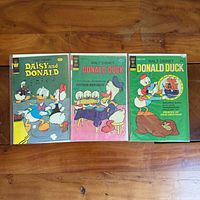 Front view of all three bagged comic books