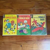 All three Donald Duck Gold Key comics in sleeves