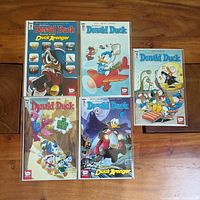 Front covers of all five Donald Duck comics