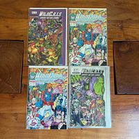 Group shot showing all four WildC.A.T.s comics, two issue #1 and two Sourcebook #2