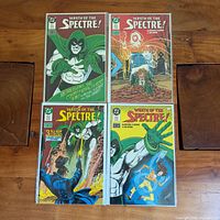 All four Wrath of the Spectre! comic books laid out