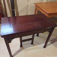 Table folded to console size front view