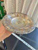 Top view of silver plated compote showing pierced rim and bowl interior