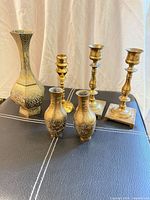 Full set showing tall vase, two small vases, three candlesticks
