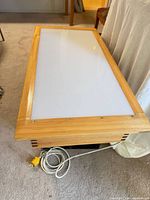 Top view showing white diffuser panel within wood frame