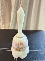 Full view of Fenton white iridescent floral bell